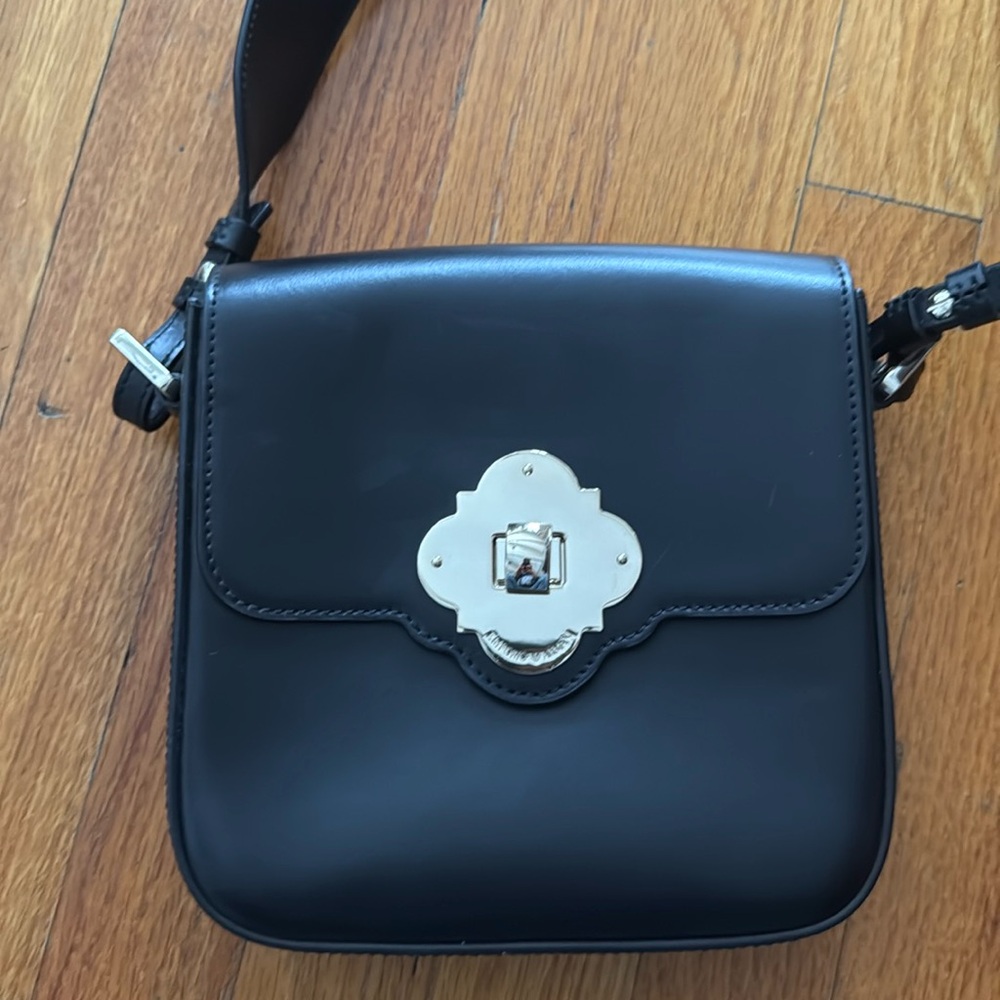 Black Emporio Armani purse gifted to me
But never used
